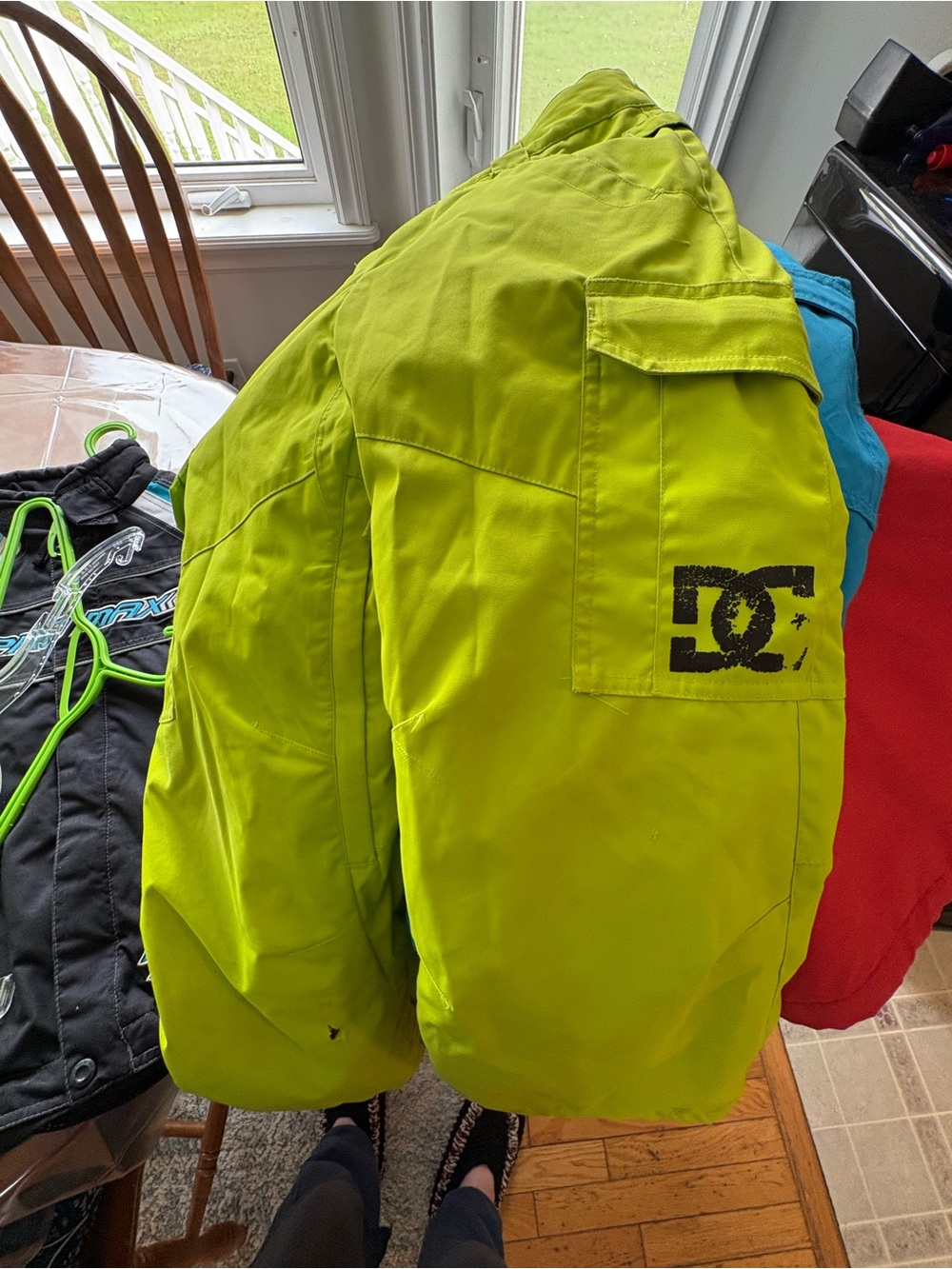 DC Bright Lime Green Kids ski pants with tiny tear with Logo